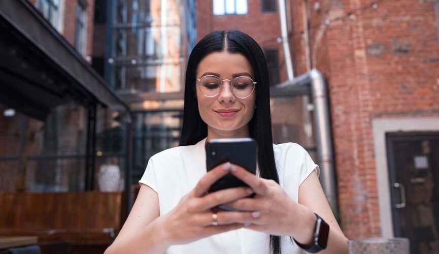 Person ordering food for delivery on a mobile phone
